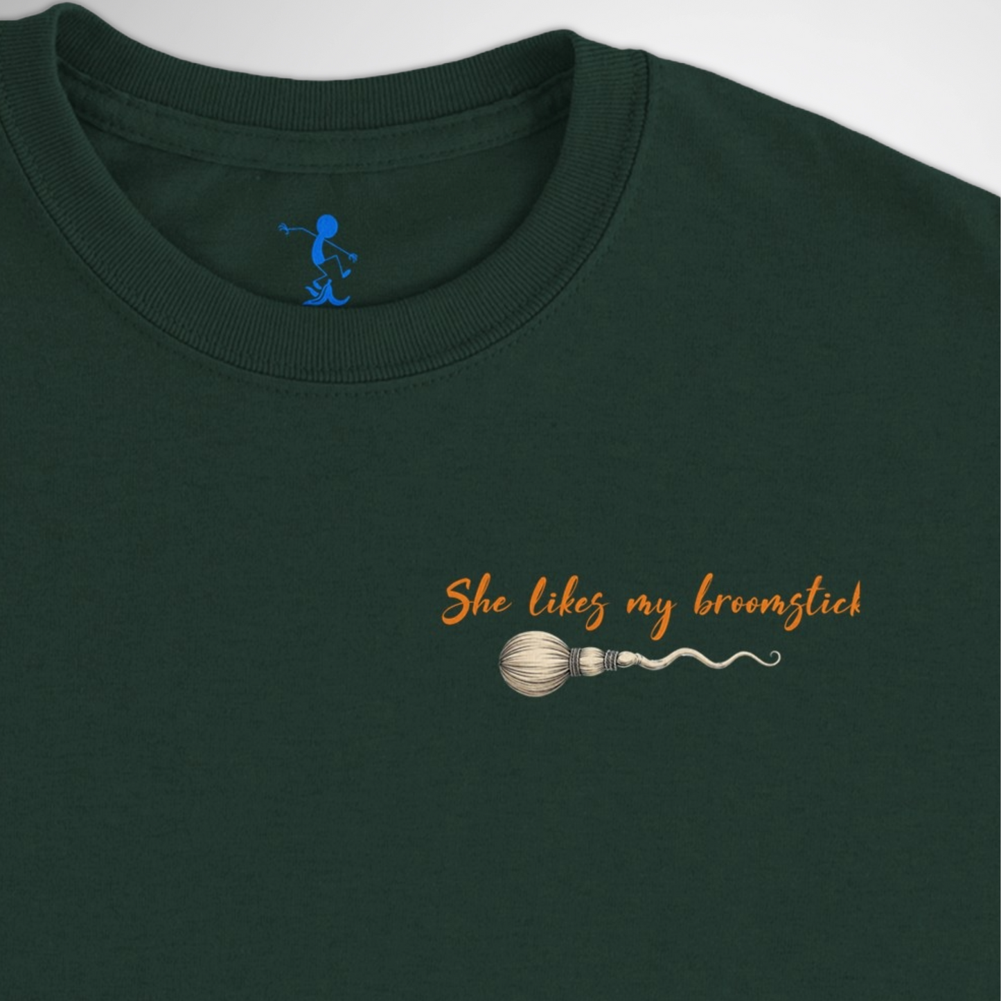 Men's She Likes My Broomstick Halloween T-shirt available in black, maroon, grey, and green