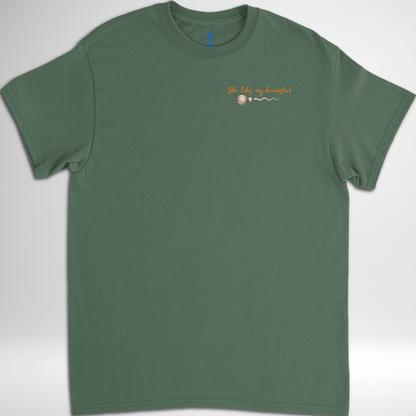 Men's She Likes My Broomstick Halloween T-shirt available in black, maroon, grey, and green